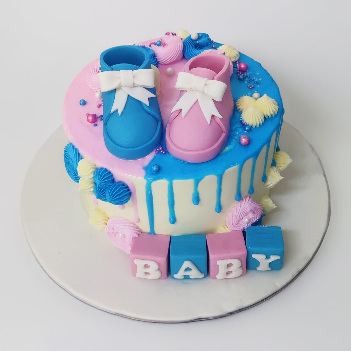 Cute baby booties cake - Crave by Leena