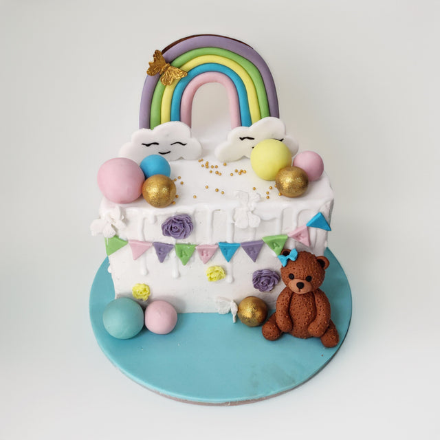 Reddy Rainbow Drip cake - Crave by Leena