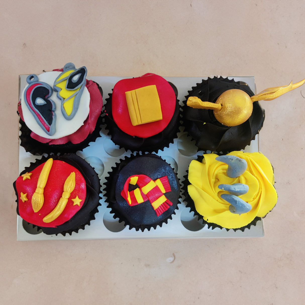 Wolverine & Harry Potter cupcakes - Crave by Leena