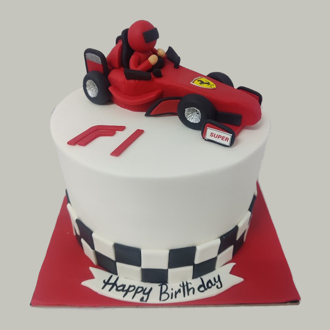 Red F1 Race Theme Cake: white buttercream with chequered band and fondant red F1 car