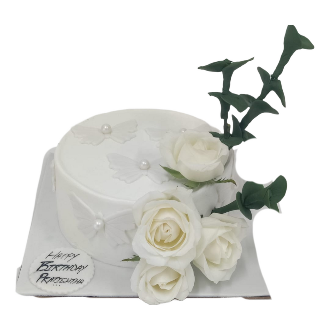 Butterfly in White floral cake - Crave by Leena