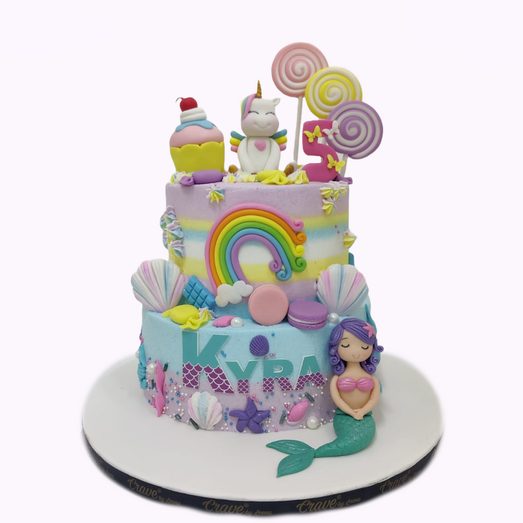 Rainbow sponge Unicorn and mermaid cake - Crave by Leena