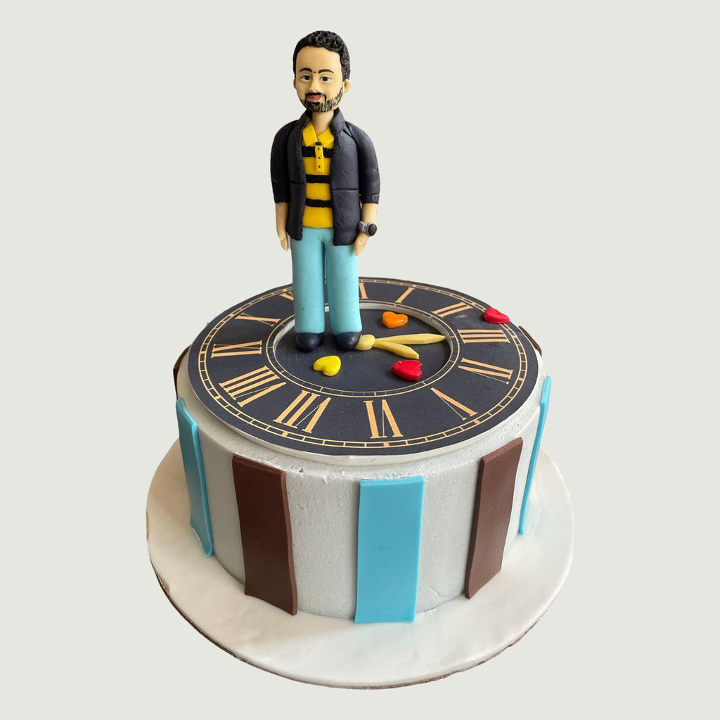 The standing Man Clock cake - Crave by Leena